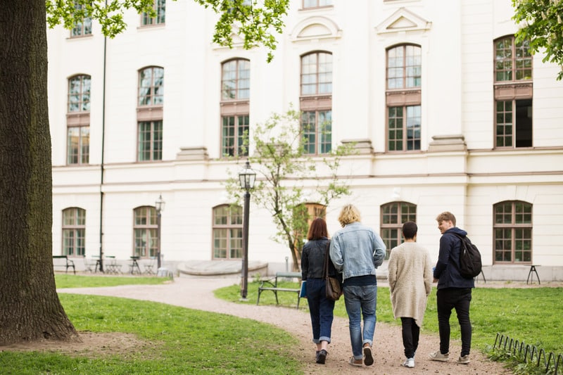 Group of kids walking on college campus