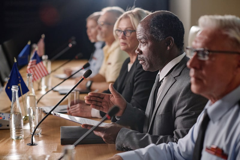 Politicians sitting at table