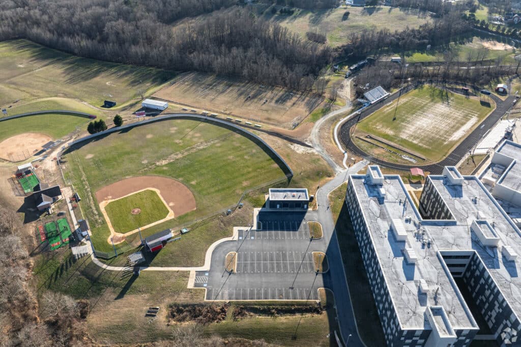 Exterior view of Northern High School in Owings, Maryland, showing the front entrance, modern brick facade, and surrounding grounds.