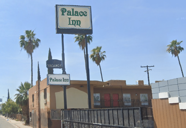 Exterior of the Palace Inn in Fresno, CA, a hotel named in a federal sex trafficking civil lawsuit.
