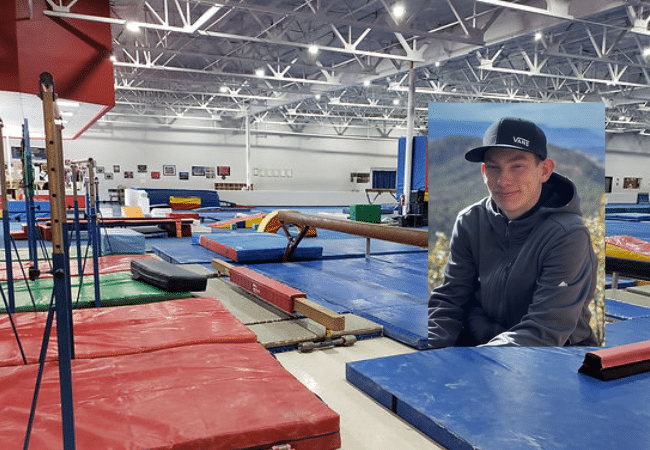 Composite image showing the interior of a gymnastics training facility, Go For It USA, alongside a photo of former gymnastics coach Michael Sullivan Nestor, who has been charged in a criminal case involving alleged offenses against two minor children.