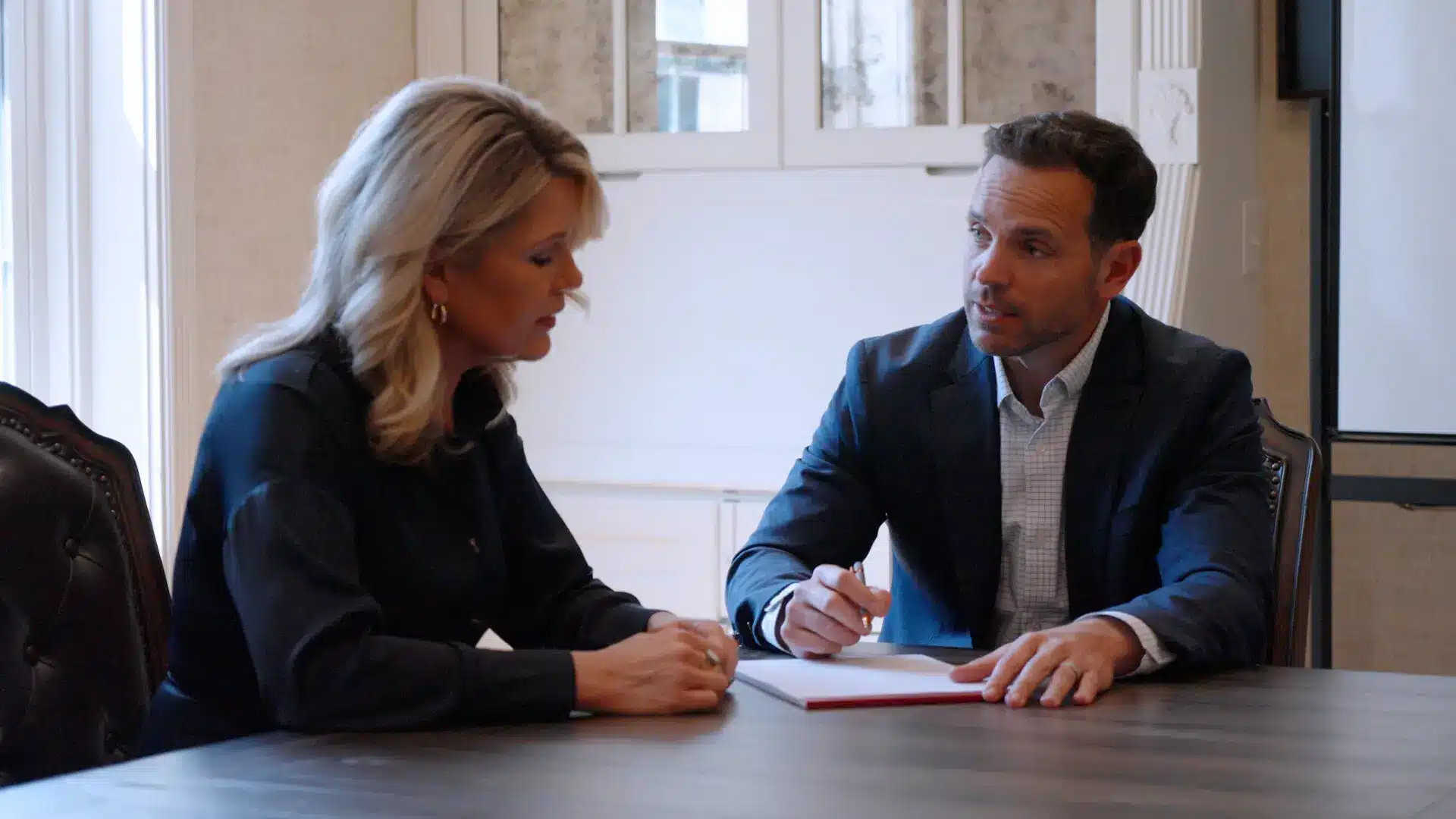 Attorney Ben Andreozzi talking with a client